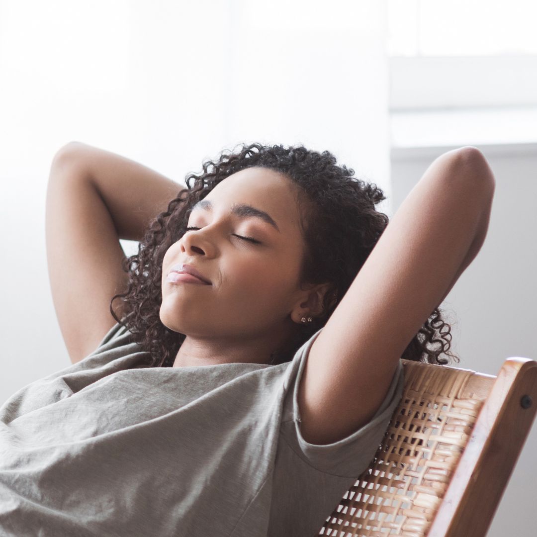 woman relaxing in chair
